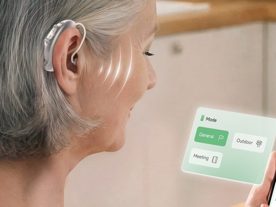 A woman adjusting her KYYWEE hearing aids from the companion app at home