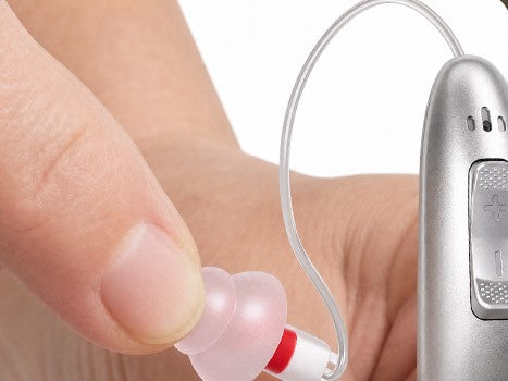 Attaching an ear tip to the sound tube
